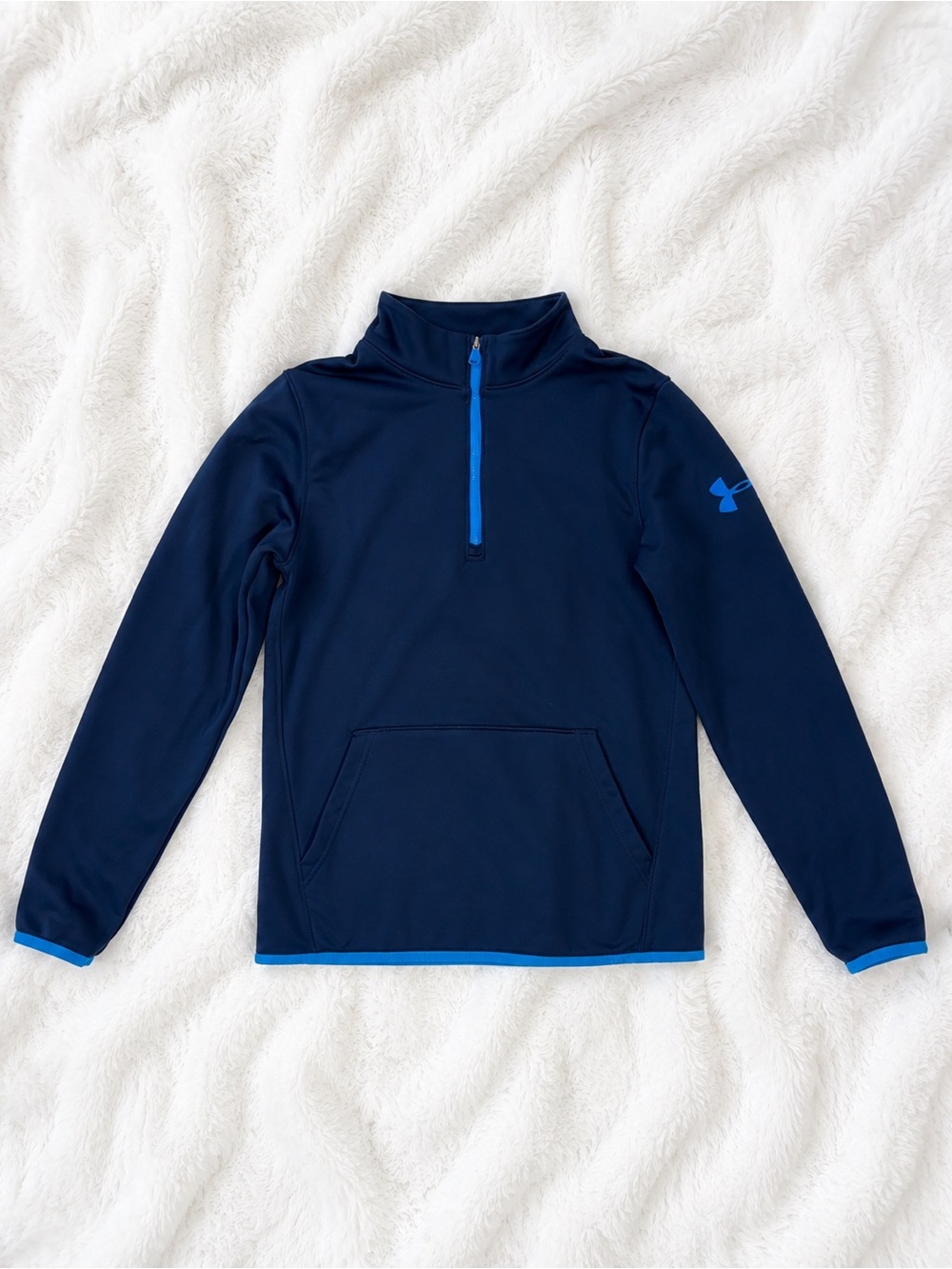 Under Armour youth size Large quarter-zip pullover in navy blue with bright blue